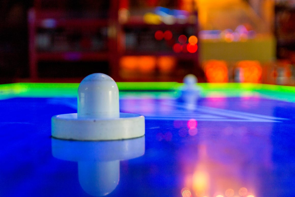 Air Hockey Game at an Arcade