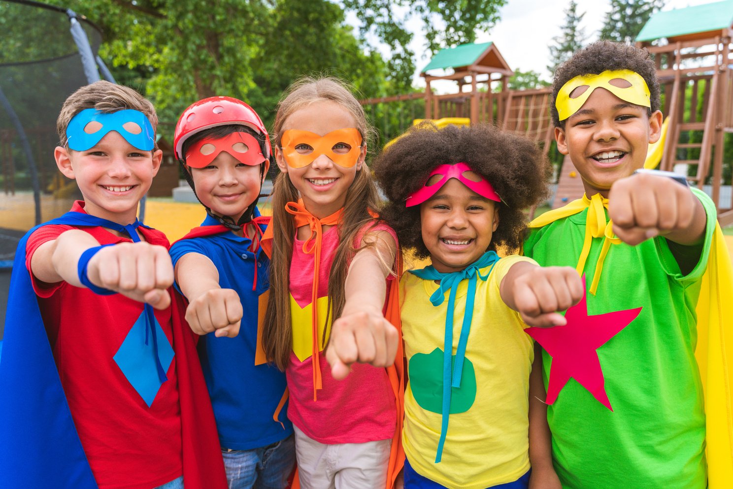 Group of Young Schooler Wearing Superhero Costumes