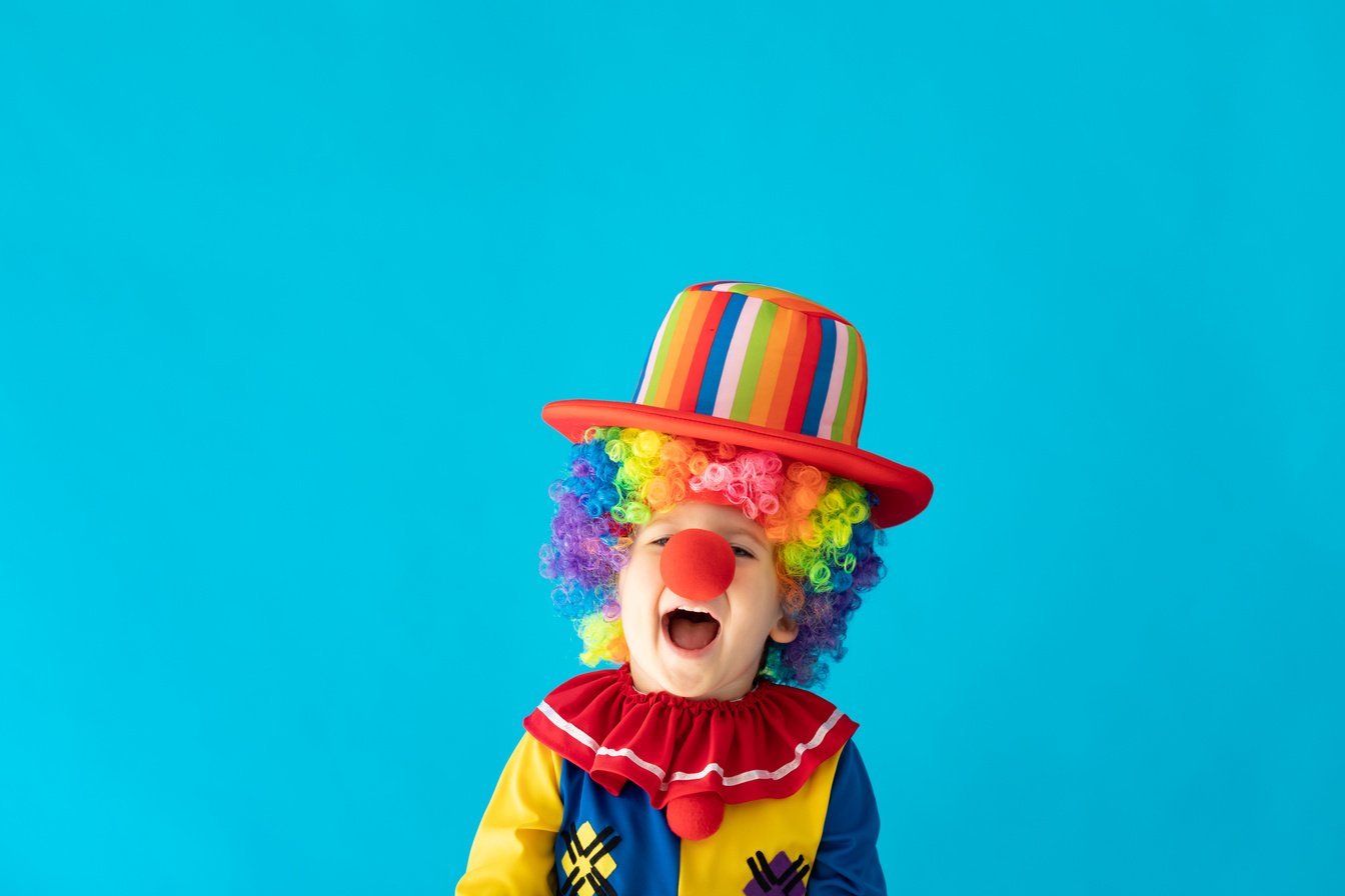 Funny Kid Clown Playing Indoor